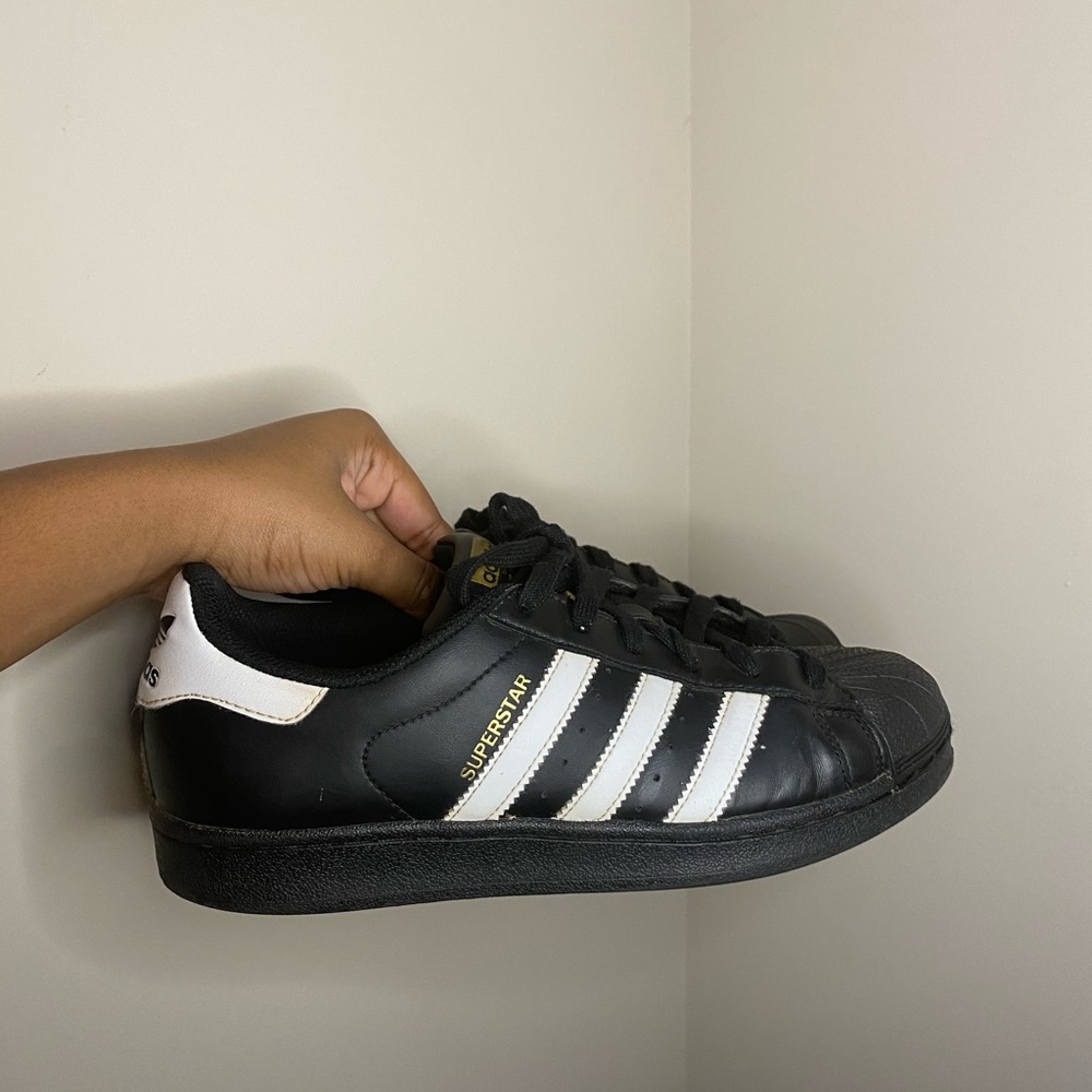 Black and white Adidas Superstar